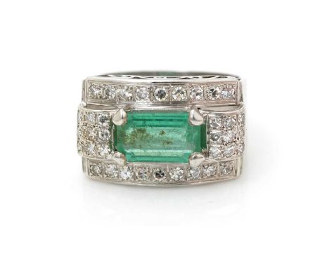 An emerald and diamond Art Deco style ring, the emerald measuring approximately 10.5 x 6.4 x 3.7mm, estimated to weigh 1.78ca