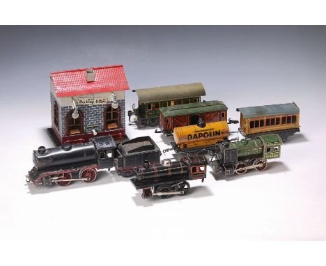 Lot drei Eisenbahnen, Spur 0, deutsch, 20/30er Jahre,  Blech, a. Märklin Lokomotive mit Tender R 910, Galerie fehlt, Federauf
