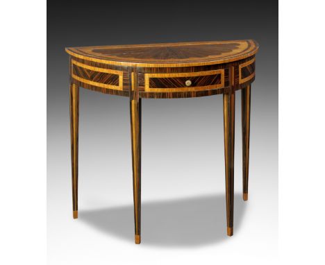 Consolle a mezzaluna lastronata in legni diversi, XIX secolo Cm 82x89x44 In stile Luigi XVI, presenta un piccolo cassetto nel