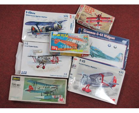 Seven Boxed 1:72nd Scale Plastic Model Military Aircraft Kits, by Hasegawa, LS, ICM, Paula Models including Soviet Fighter Bi