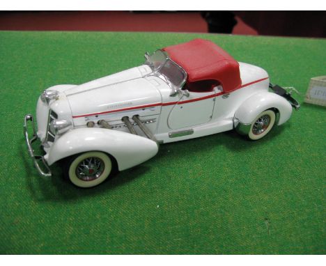 A Franklin Mint 1:24th Scale Diecast Model 1935 Auburn 851 Speedster, missing literature and outer box, model has previously 