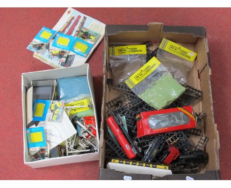 A Quantity of "OO" Model Railway and Accessories, often Tri-ang, including clockwork locomotives, lineside accessories, track