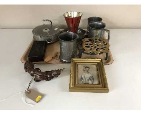 A tray of pewter tankards, trivets, hanging scales, bakelite cased weight, bottle openers etc 