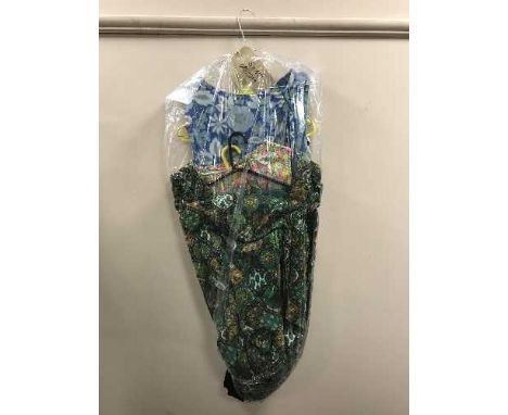A full rail of vintage dresses, 50's style, 60s style 