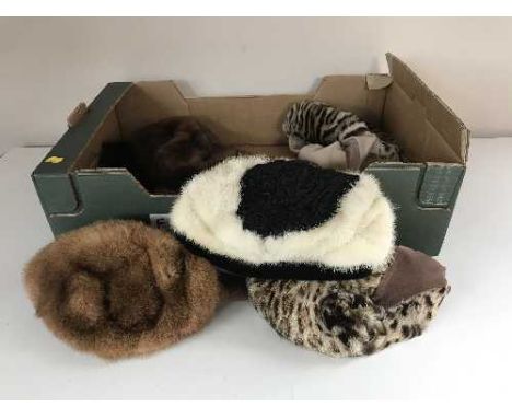 A box of nine assorted vintage fur hats 