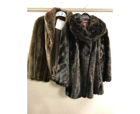 A full rail of vintage coats, lady's coats and jackets 