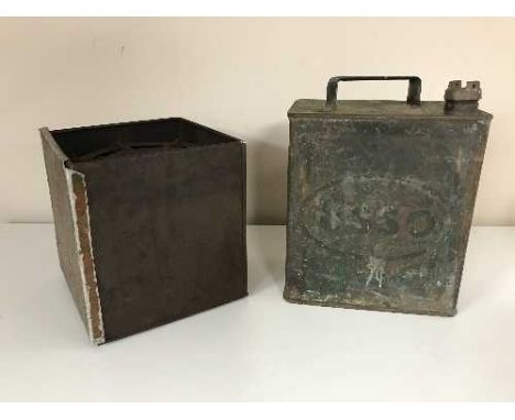 A box of Primus stove and vintage Esso oil can 