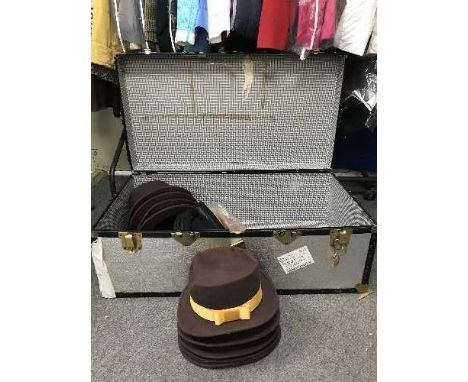 A metal trunk of bowler and gent's hats 