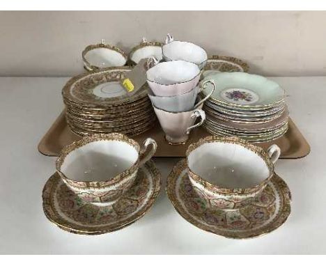 A tray of Royal Standard eighteen piece china tea set and a part Crown tea service 