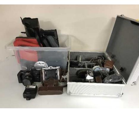 Two boxes and a case of camera equipment - Poloroid, Pratika, Matz flash etc 