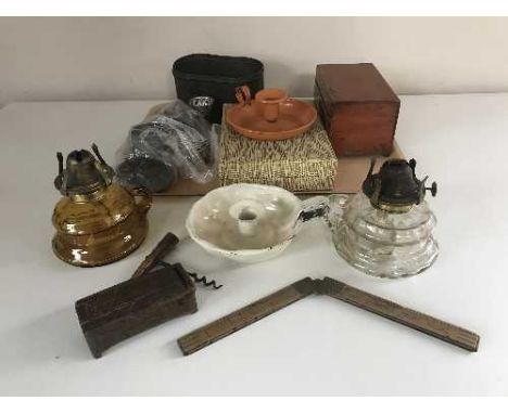 Two glass oil lamps, enamel candle holders, pine box, folding rule etc