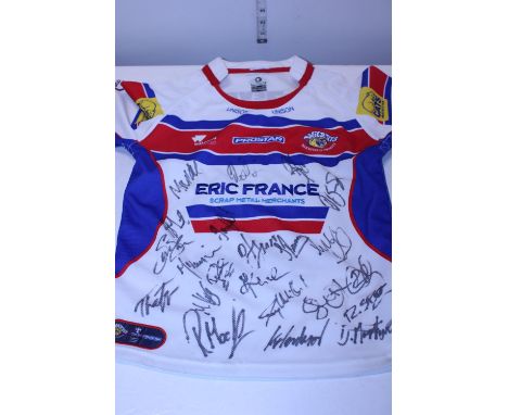 A signed Wakefield Trinity child's ruby league shirt 
