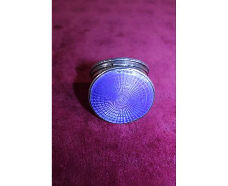 A hallmarked silver compact with blue guilloche enamel decoration (damage to enamel) 