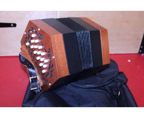A 31 button squeeze box 