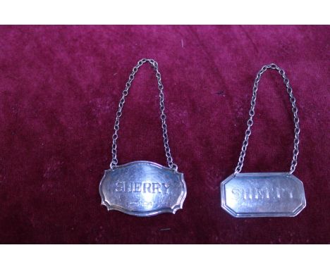 Two hallmarked silver Sherry decanter labels 