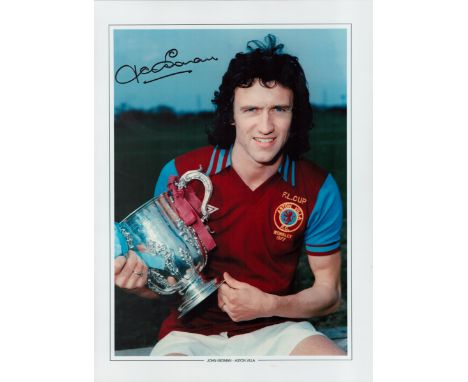 Football John Gidman signed 16x12 Aston Villa colour print pictured with the League cup in 1977. Good condition. All autograp