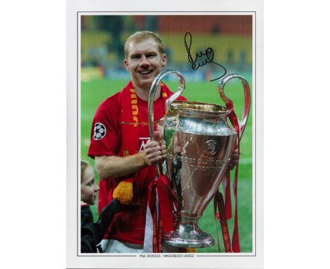 Football Paul Scholes signed 16x12 colour print pictured holding the Champions League trophy. Good condition. All autographs 