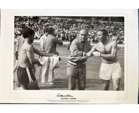 Football George Cohen signed 16x12 black and white print picturing the iconic moment after the quarter final in the 1966 Engl