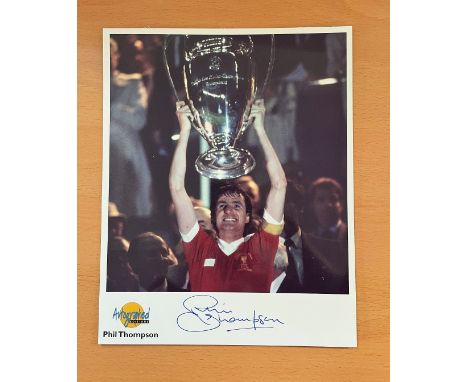 Football. Phil Thompson Signed 10x8 colour Autographed Editions page. Bio description on the rear. Photo shows Thompson lifti