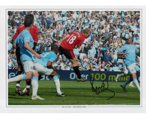 Football Paul Scholes signed 16x12 colour print pictured in action in the Manchester derby. Good condition. All autographs co