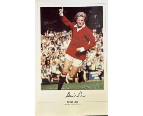 Football Denis Law signed 20x12 Manchester United colour print. Good condition. All autographs come with a Certificate of Aut