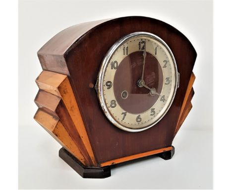 ART DECO MANTLE CLOCKin a stepped fan shape mahogany case with a circular chapter ring with Arabic numbers and an eight day m