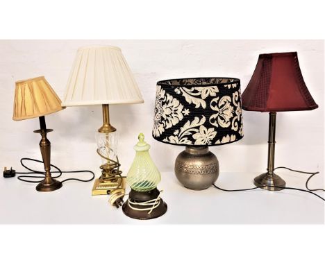 FIVE ASSORTED TABLE LAMPSincluding a steel lamp raised on a circular base with a burgundy shaped shade, 52cm high, a glass an