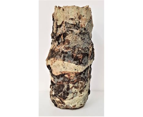 JAMES EWEN HENDERSON (1934-2000)a stoneware vase of irregular form with applied slips, unsigned, 42cm high 