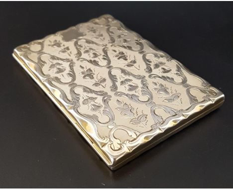 VICTORIAN SILVER CARD CASEwith engine turned decoration, the interior lined in red watered silk with two pockets, Birmingham 