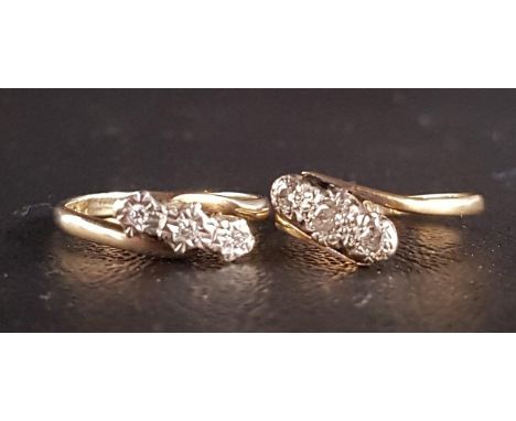 TWO DIAMOND THREE STONE RINGSboth with twist settings, one with diamonds totaling approximately 0.15cts, in eighteen carat go