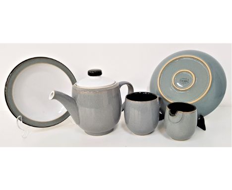 DENBY DINNER SERVICEwith a grey and black ground, comprising four mugs, milk jug, tea pot, fourteen bowls, two dinner plates 