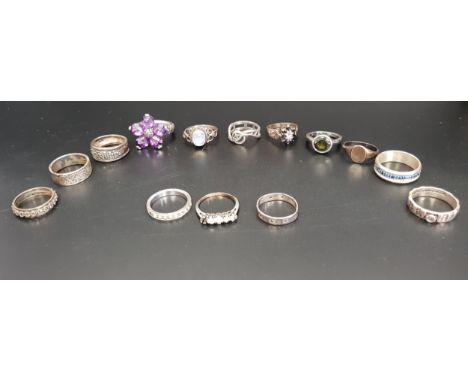 SELECTION OF FOURTEEN SILVER RINGSof various sizes and designs, including a sapphire and diamond cluster ring, moonstone, mar