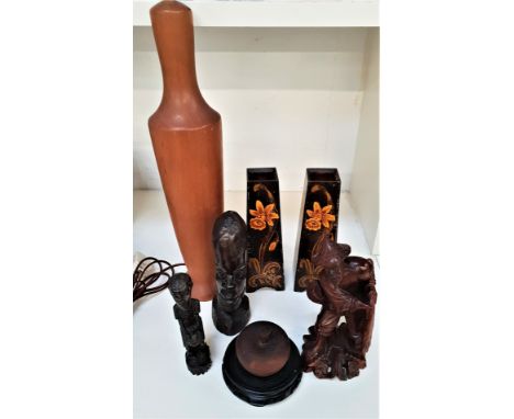 SELECTION OF CARVED ITEMSincluding a teak table lamp, 54.5cm high, pair of poker work tapering vases, 24.5cm high, two carved