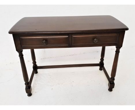 ERCOL DARK OAK SIDE TABLEwith a moulded top above two frieze drawers, standing on turned supports united by a stretcher, 74.5