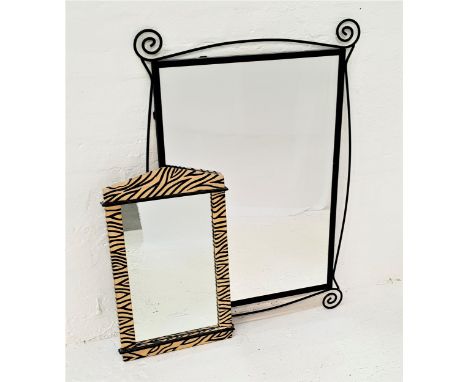 WROUGHT IRON WALL MIRRORin a shaped frame with a plain plate, 102cm x 73.5cm, together with a Zebra painted wall mirror with 
