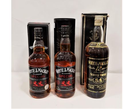 THREE BOTTLES OF BLENDED SCOTCH WHISKYcomprising Whyte & Mackays De Luxe 12 year old, 75 Proof & 1 Litre, two Whyte & Mackay 