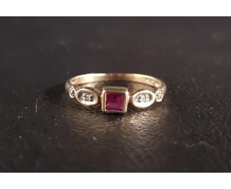 RUBY AND DIAMOND RINGthe central square cut ruby flanked by small diamonds, on nine carat gold shank, ring size K 