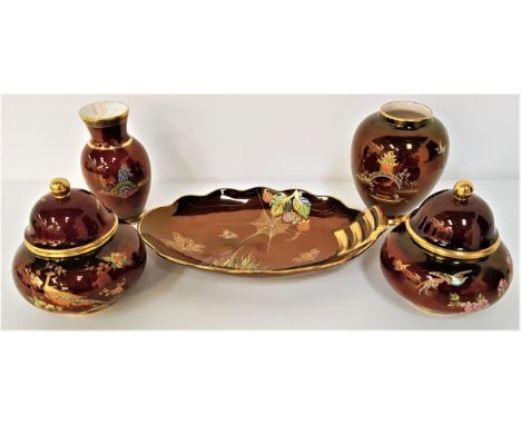 CARLTON WARE ROUGE ROYALEcomprising a shaped dish, a pair of squat lidded jars, an ovoid vase and hardwood stand and a simila