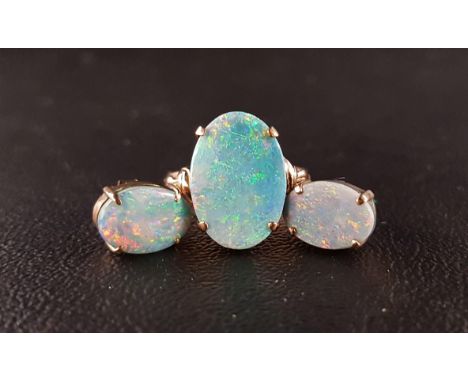 OPAL DOUBLET RING AND MATCHING EARRINGSthe ring set with single oval opal doublet measuring 1.6cm x 1.1cm, on fourteen carat 