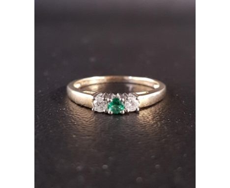 EMERALD AND DIAMOND THREE STONE RINGthe central emerald flanked by diamonds, on nine carat gold shank, ring size O-P 