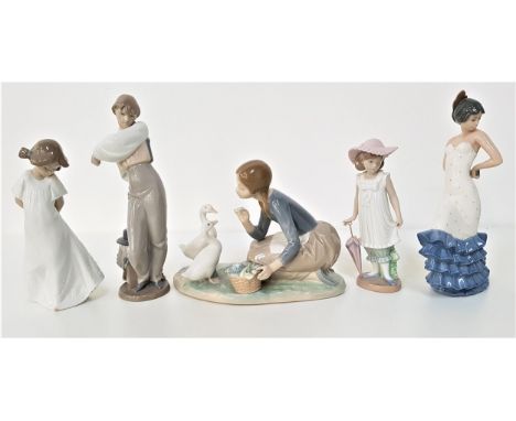 LLADRO FIGURINEdepicting a young girl feeding ducks, 23cm long and four Nao figurines - male Spanish dancer, 25cm high, femal