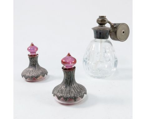 PERFUME ATOMISER WITH STERLING SILVER MOUNTS AND A PAIR OF SILVER OVERLAID PERFUME BOTTLES