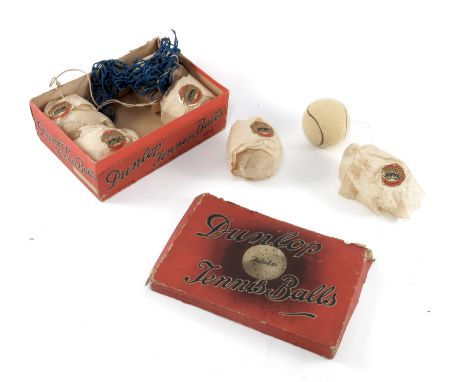 A BOXED SET OF 6 VINTAGE DUNLOP TENNIS BALLS DATED 1935 WITH ORIGINAL WRAPPERS
