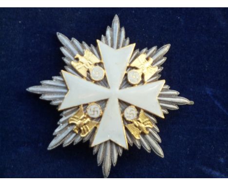 MILITARY INTEREST, A VARIANT OF GERMAN 'ORDER OF THE GERMAN EAGLE' WITH STAR ON A GRAND CROSS, SILVER/ GOLD PLATED EFFECT, AN