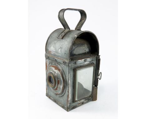 A VINTAGE TRANSPORT HAND LAMP PARTLY CONVERTED TO ELECTRIC, POSSIBLY RAILWAY WITH BRACKET ON REAR