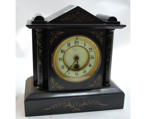 An Edwardian black slate mantel clock having an enamel dial, Arabic numerals and cylinder movement Condition Report / Extra I