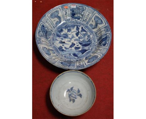 An 18th century Chinese kraak porcelain bowl of good size, having a central panel depicting birds amongst foliage (a/f, with 