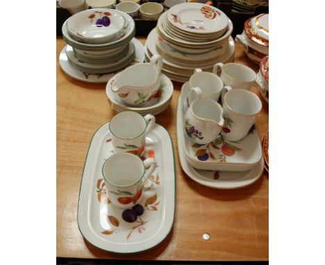 A collection of Royal Worcester table wares in the Evesham and Evesham Vale patterns