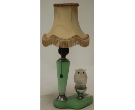 A 1930s pressed glass table lamp and shade, surmounted by an owl Condition Report / Extra Information Fingernail chip to outs