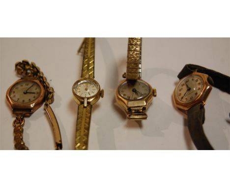 A 9ct gold cased ladies wristwatch having manual wind movement, two others, and one gold plated example (3)